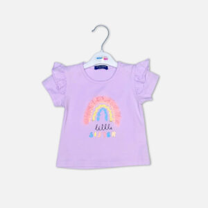 Baby girl summer outfit featuring a purple "Little Sister" t-shirt with a textured 3D rainbow and ruffle sleeves paired with grey shorts with lace detailing from Mini & Me.