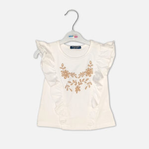 Baby girl summer outfit featuring a white ruffle-sleeve top with floral embroidery and matching tan embroidered shorts from Mini & Me.
