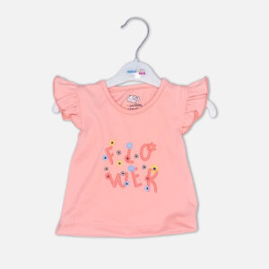 Baby girl 3-piece summer clothing set featuring a peach top with "Flower" graphic, a white and pink polka dot top, and blue ruffle shorts from Mini & Me.