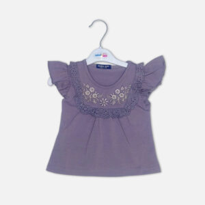 Baby girl summer outfit featuring a dusty purple top with floral embroidery and eyelet lace ruffles paired with matching lace-trimmed shorts from Mini & Me.