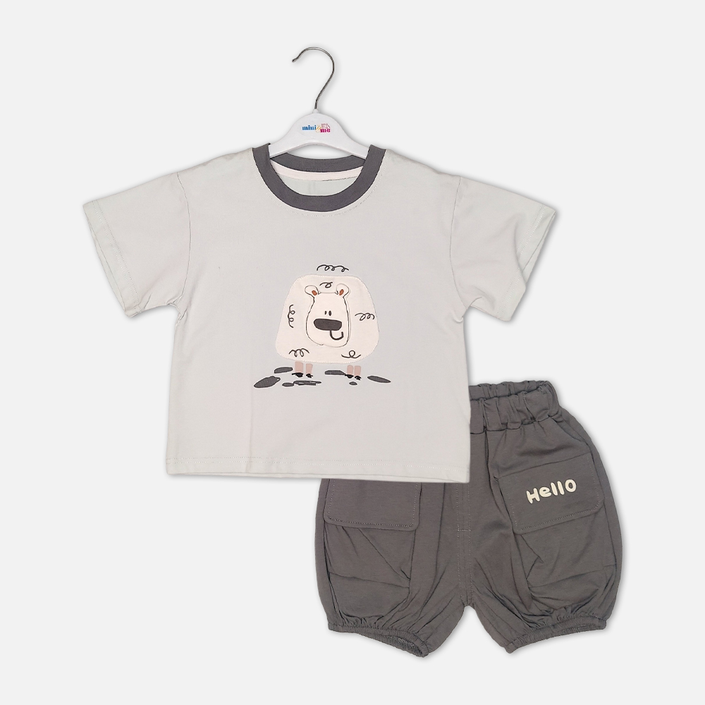 1-1 Toddler boy 2-piece summer clothing set featuring a cream t-shirt with a cartoon sheep graphic and a charcoal grey crewneck collar paired with matching grey harem-style cargo shorts with "Hello" pockets from Mini & Me.