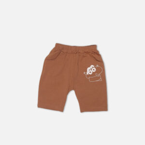 Toddler boy 2-piece summer clothing set featuring a cream t-shirt with an all-over Crayon Shin-chan character graphic print paired with matching brown shorts from Mini & Me.