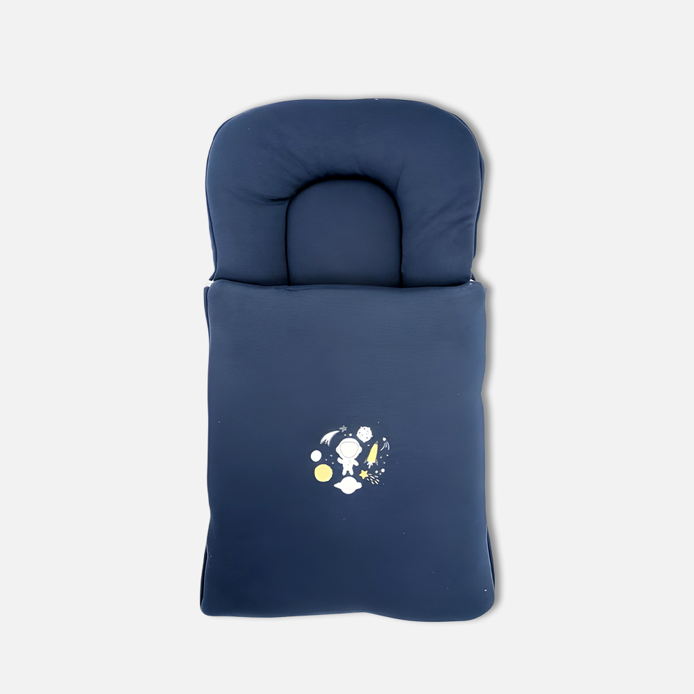 CarryNest1 A standalone premium baby carry nest in deep navy blue featuring a central white and yellow cartoon space astronaut, rocket, and stars print with a cushioned headrest from Mini & Me (CarryNest1.jpg).