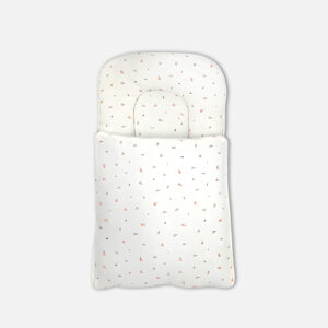 Premium white cotton baby carry nest with minimalist scattered print and built-in head support pillow from Mini & Me, as shown in CarryNest3.jpg.