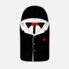 Dapper black and white tuxedo-style baby carry nest featuring a bright red bow tie, decorative buttons, and an integrated hood from Mini & Me,