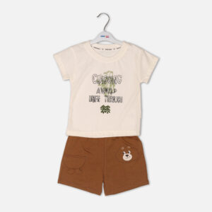 Toddler boy 2-piece summer clothing set featuring a cream t-shirt with a green "Cragging" graphic print, paired with matching brown elasticated shorts detailed with a cartoon bear face pocket from Mini & Me.
