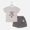 Toddler boy 2-piece summer clothing set featuring a grey heather t-shirt with a purple "Cragging" graphic print, paired with matching charcoal grey elasticated shorts detailed with a cartoon bear face novelty pocket from Mini & Me.