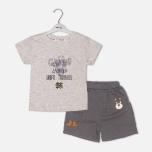 Toddler boy 2-piece summer clothing set featuring a grey heather t-shirt with a purple "Cragging" graphic print, paired with matching charcoal grey elasticated shorts detailed with a cartoon bear face novelty pocket from Mini & Me.