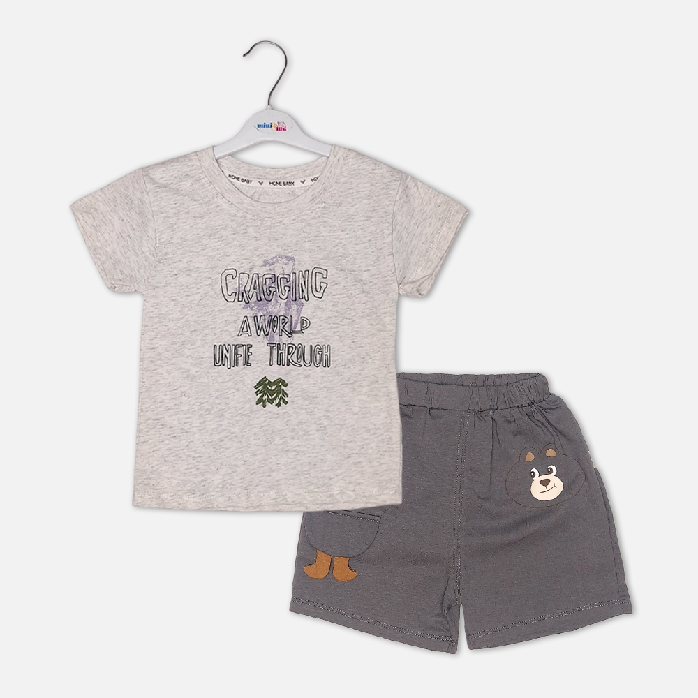boysSuit14161-3-1 Toddler boy 2-piece summer clothing set featuring a grey heather t-shirt with a purple "Cragging" graphic print, paired with matching charcoal grey elasticated shorts detailed with a cartoon bear face novelty pocket from Mini & Me.