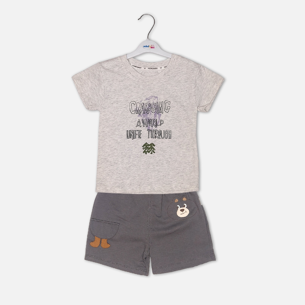 boysSuit14161-3-2 Toddler boy 2-piece summer clothing set featuring a grey heather t-shirt with a purple "Cragging" graphic print, paired with matching charcoal grey elasticated shorts detailed with a cartoon bear face novelty pocket from Mini & Me.