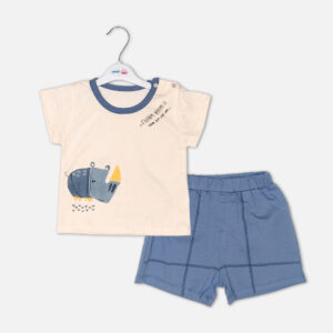 Toddler boy 2-piece summer clothing set featuring a cream t-shirt with a blue cartoon rhinoceros graphic and blue neckline trim, paired with matching blue elasticated shorts from Mini & Me.