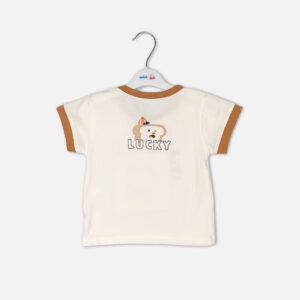 Toddler boy 2-piece summer clothing set featuring an off-white t-shirt with a "Lucky" cartoon toast graphic and tan trim details, paired with matching tan elasticated shorts from Mini & Me.