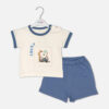 Toddler boy 2-piece summer clothing set featuring a cream t-shirt with a blue cartoon rhinoceros graphic and blue neckline trim, paired with matching blue elasticated shorts from Mini & Me.