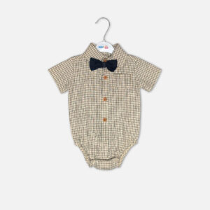 Checkered baby bodysuit with black bow tie next to denim suspender shorts with tan leather details on a white background.