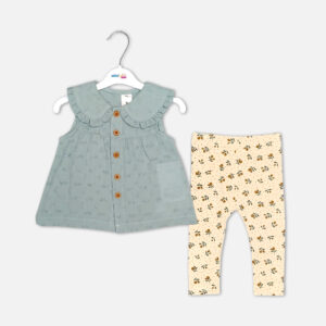 Baby girl 2-piece summer clothing set displaying a sleeveless sage green button-down frock with a ruffled Peter Pan collar and textured fabric, paired with cream-colored ankle leggings featuring an all-over ditsy floral print from Mini & Me.