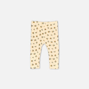 Baby girl 2-piece summer clothing set displaying a sleeveless sage green button-down frock with a ruffled Peter Pan collar and textured fabric, paired with cream-colored ankle leggings featuring an all-over ditsy floral print from Mini & Me.