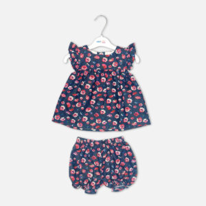 Baby girl 3-piece summer clothing set showcasing a sleeveless navy blue frock with a red and pink floral print and ruffled shoulders, displayed alongside a white short-sleeve bodysuit with a "Happy Flower" graphic print and matching navy floral bloomer shorts from Mini & Me.