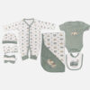 7 piece newborn baby clothing gift set featuring a sage green and off-white camper van print, including a sleepsuit, short sleeve bodysuit, hooded swaddle blanket, bib, beanie hat, scratch mittens, and a washcloth laid flat on a white background.