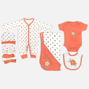 Mini & Me 7-piece newborn clothing set in peach and white floral print including sleepsuit, bodysuit, cap, mittens, bib, blanket, and washcloths.