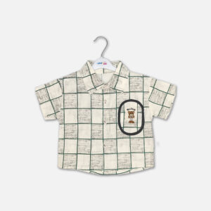 Mini and Me boys two piece summer suit set hanging on a white hanger, featuring a cream short sleeve button down shirt with a green checkered grid pattern and a cartoon bear chest pocket graphic, paired with matching textured charcoal grey shorts featuring a small square number patch, displayed on a light gray background in file 20-1_2.jpg.