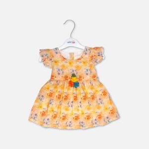Mini and Me baby girl yellow and orange cotton frock with rose print and colorful 3D flower detail on the waist hanging on a white hanger