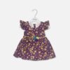 Mini and Me baby girl purple cotton frock with yellow flower print and colorful 3D fabric flower detail on the waist hanging on a white hanger
