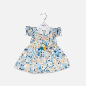 Baby girl powder blue cotton frock decorated with white and yellow floral prints, layered ruffle sleeves, and a yellow waistband with fabric flower accents hanging on a white hanger.