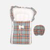 Newborn baby carry nest and matching head-support pillow featuring a blue and orange plaid pattern with a white fabric bow accent on the front.