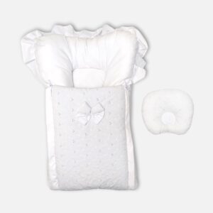 Premium white baby carry nest and sleeping bag featuring delicate floral eyelet embroidery, a fabric bow, ruffle-trimmed hood, and a matching separate head pillow.