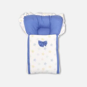 White baby carry nest and sleeping bag decorated with pastel blue and yellow star prints, featuring a solid blue cushioned headrest, ruffle-trim hood, and a decorative blue bow.