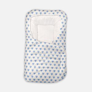 White baby swaddle wrap and sleeping pod featuring an all-over blue heart print pattern, a cushioned headrest section, and an adjustable wrap-around flap.