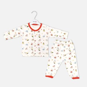 Unisex white cotton baby nightwear set from Mini and Me featuring a long-sleeve button-up top and matching pants with a colorful construction vehicle pattern and red trim.