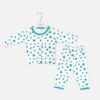 Unisex white cotton baby sleepwear set from Mini and Me showing a long-sleeve button-up top and matching pull-on pants decorated with an all-over turquoise heart print and teal trim.
