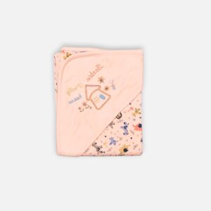 Peach pink soft cotton hooded baby blanket folded to show an embroidered house on the corner hood and a colorful jungle animal pattern on the lining.