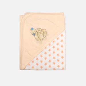 A folded peach and white 100% cotton hooded baby blanket featuring an embroidered swan design on the solid corner hood and a repeating small peach star print on the main fabric section.