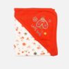 A folded cotton hooded baby blanket featuring a vibrant red corner hood with embroidered ladybug details and a white fabric body decorated with an orange and grey floral pattern.