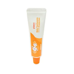 Pigeon baby toothpaste oral care protection orange flavour tube with orange cap and cute cartoon tooth illustrations