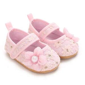 Sweet Elegance for Special Moments Elevate your baby's formal wardrobe with the beautiful boutique style of Mini and Me. These baby girl pink dress shoes combine classic luxury with essential comfort for early development. The intricate pink floral lace and delicate mesh upper pair beautifully with dresses, rompers, and celebratory outfits, making them an ideal choice for holiday parties, birthdays, or any memorable family occasion. Soft and Supportive Design for Developing Feet Crafted with careful attention to infant foot health, these pre-walker and first-walker shoes offer excellent functionality: Floral Lace Overlay: Features a sophisticated lace overlay with embroidered flower motifs that add a timeless, high-end texture to the soft mesh upper material. Pearl-Centered Lace Flower: A beautifully layered fabric blossom adorns the front toe box, completed by a cluster of shimmering mini faux pearls at the center. Easy Adjustable Closure: Features a reliable hook-and-loop fastener on the instep strap that opens wide, allowing parents to effortlessly slip the shoe on and adjust for a secure, custom fit. Flexible Anti-Slip Sole: Designed with a lightweight, flexible outer sole featuring a pebble-grid texture for reliable traction and natural foot flexing. Padded Interior Comfort: Lined with a smooth, breathable lining and a cushioned footbed to prevent friction against sensitive skin, providing comfortable wear all day long. Convenient Heel Pull Tab: Includes an integrated pull loop at the heel to make dressing active babies fast and stress-free for parents.