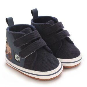 Pair of dark navy corduroy and leather-style high-top baby sneakers featuring dual hook-and-loop straps, embroidered tractor and snail illustrations on the side, a white sole border, and a textured non-slip outsole.