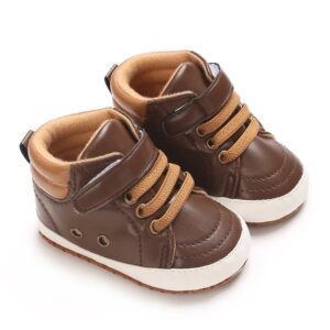Pair of chocolate brown faux leather high-top baby sneakers with camel-tan padded ankle collars, tan elastic laces, a single hook-and-loop strap, and a white sole border.