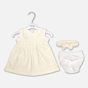 A premium three-piece baby girls cream summer clothing set featuring a sleeveless eyelet embroidered frock with a front bow waist detail, a matching elastic bow headband, and white diaper cover underwear, displayed against a clean background.