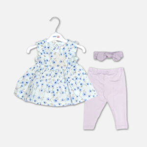 A premium three-piece summer clothing set for baby girls featuring a sleeveless flared cream frock with a blue floral print and shoulder ruffles, paired with pastel lilac leggings and a matching knotted bow headband, displayed on a white hanger.